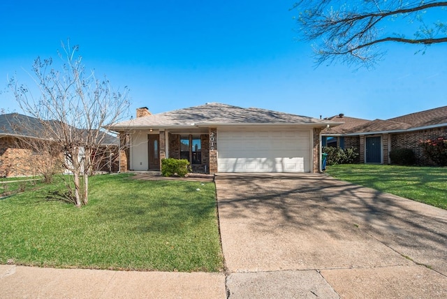 single story home with a garage, driveway, a chimney, and a front lawn
