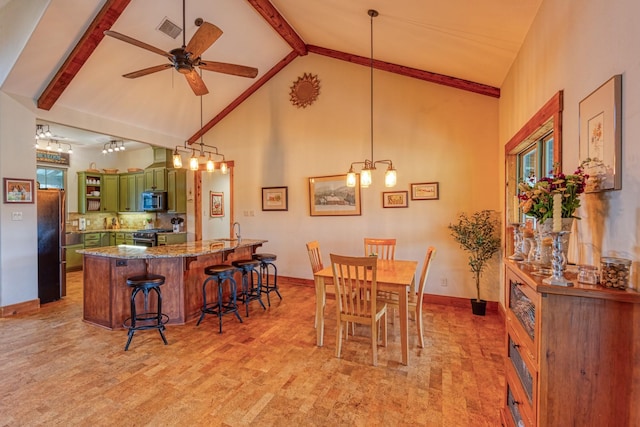dining room with beamed ceiling, high vaulted ceiling, a ceiling fan, and visible vents