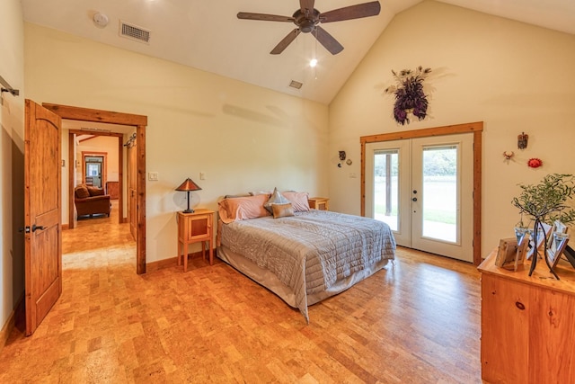 bedroom featuring high vaulted ceiling, light wood-style flooring, visible vents, access to exterior, and french doors