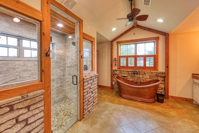 bathroom featuring visible vents, ceiling fan, a stall shower, and lofted ceiling
