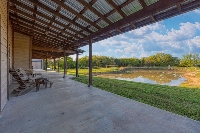 view of patio / terrace featuring a water view