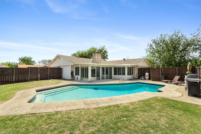 2113 Victoria Rd, Carrollton, TX 75007 - view of pool with a fenced backyard, a patio, a fenced in pool, and a lawn