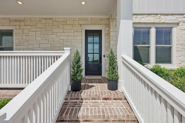 1304 S Pecan Pkwy, Northlake, TX 76247 - view of exterior entry featuring stone siding and a balcony