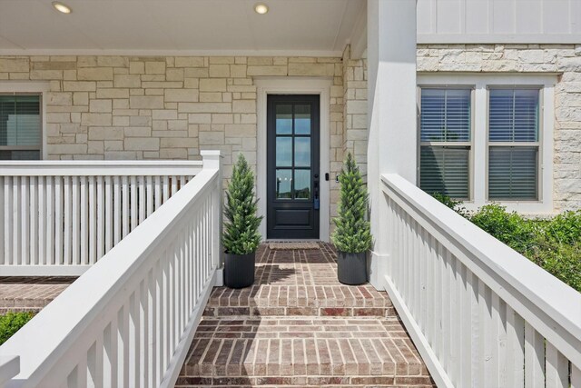 1304 S Pecan Pkwy, Northlake, TX 76247 - property entrance with a balcony and stone siding