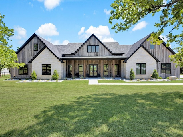 1209 Eagles Bluff Dr, Weatherford, TX 76087 - view of front of property with stone siding, a front lawn, roof with shingles, and french doors