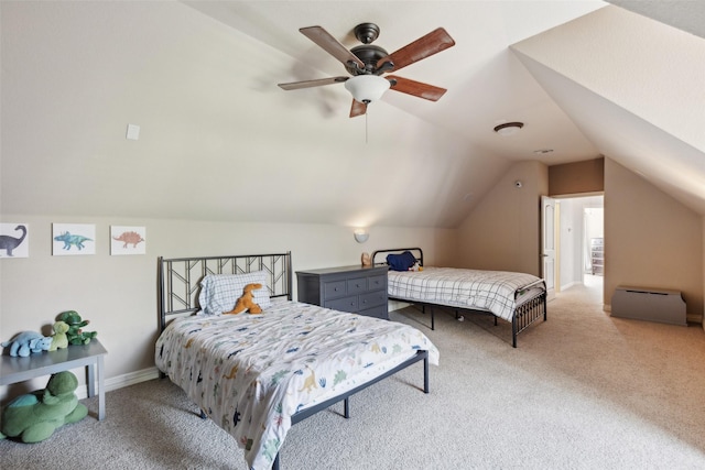 bedroom featuring ceiling fan, lofted ceiling, and light colored carpet