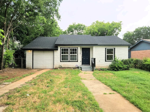 5816 Kilpatrick Ave, Fort Worth, TX 76107 - ranch-style home with stone siding, a garage, driveway, and roof with shingles