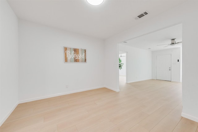 5816 Kilpatrick Ave, Fort Worth, TX 76107 - unfurnished room featuring light wood-style flooring, ceiling fan, and baseboards