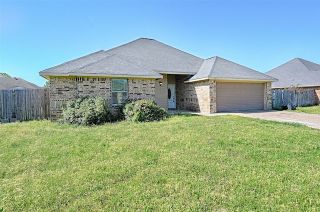 ranch-style home with a front yard, fence, brick siding, an attached garage, and driveway