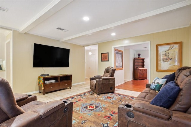 living area featuring visible vents, baseboards, beam ceiling, and light tile patterned flooring