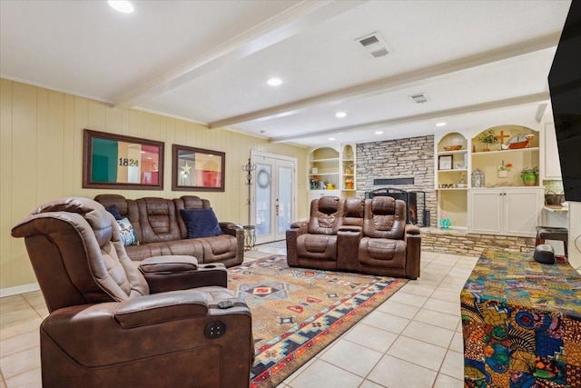living area featuring light tile patterned floors, beam ceiling, ornamental molding, and visible vents