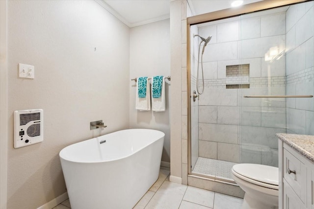 full bathroom with crown molding, vanity, toilet, a freestanding bath, and a stall shower