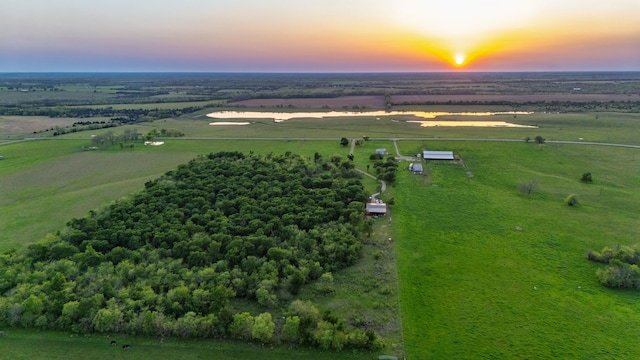 aerial view at dusk with a rural view
