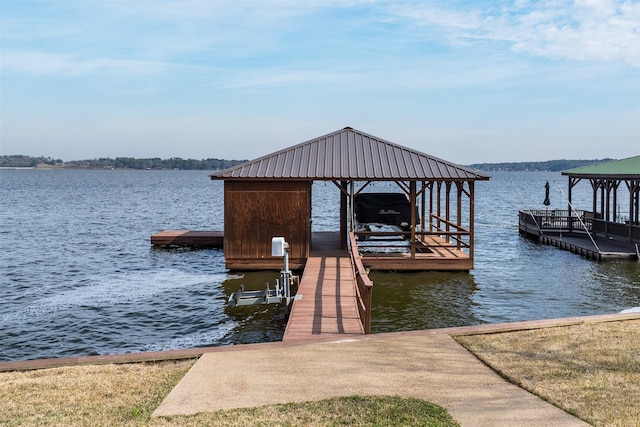 view of dock with a water view