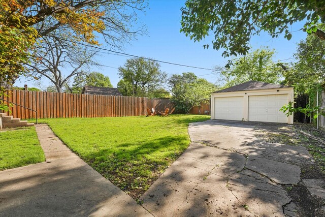 1622 Hollywood Ave, Dallas, TX 75208 - view of yard with an outbuilding, a garage, and fence