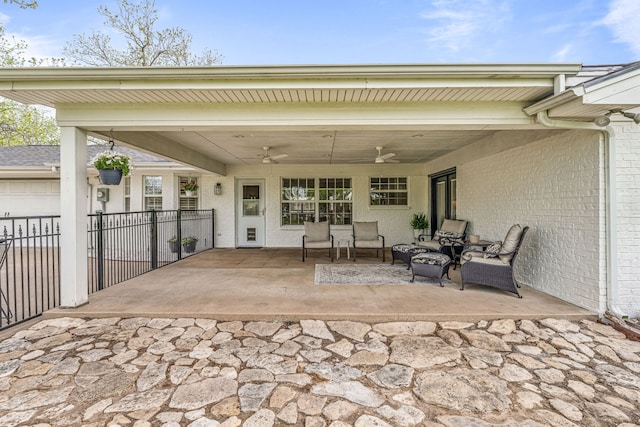 view of patio / terrace with an outdoor living space and a ceiling fan