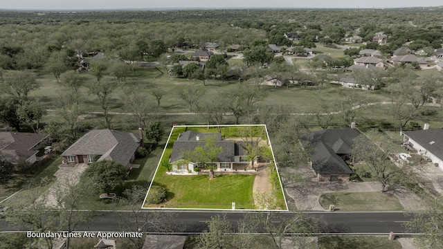 aerial view with a view of trees and a residential view