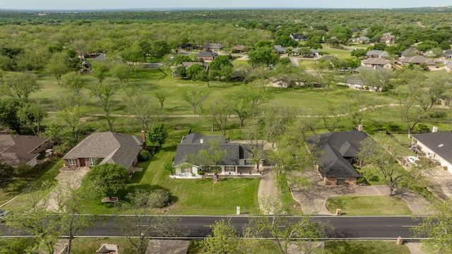 birds eye view of property with a residential view and a forest view