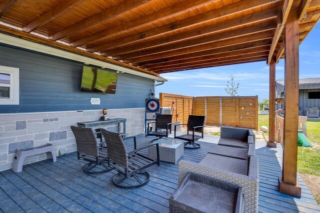 view of patio / terrace with outdoor lounge area and a deck
