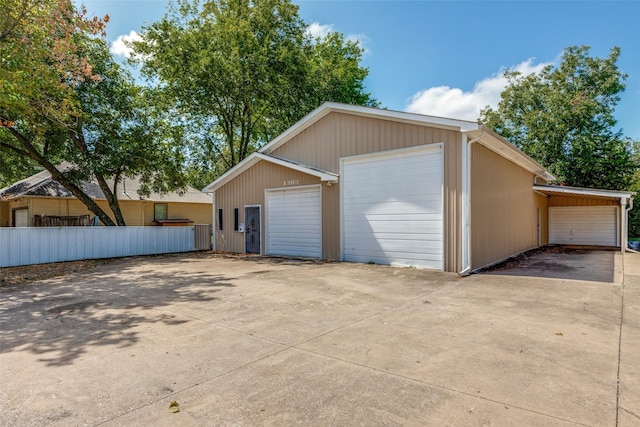 1303 N Church St, Mckinney, TX 75069 - garage featuring a detached garage and fence