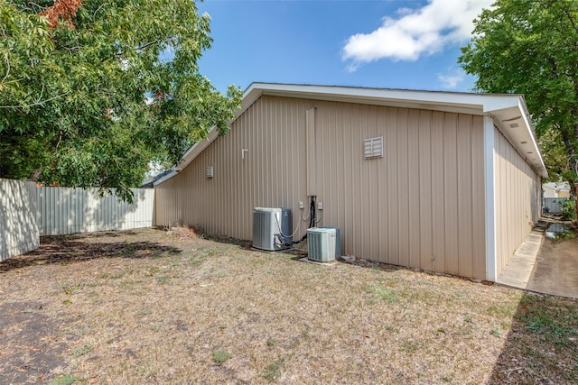 1303 N Church St, Mckinney, TX 75069 - view of property exterior with central AC and fence