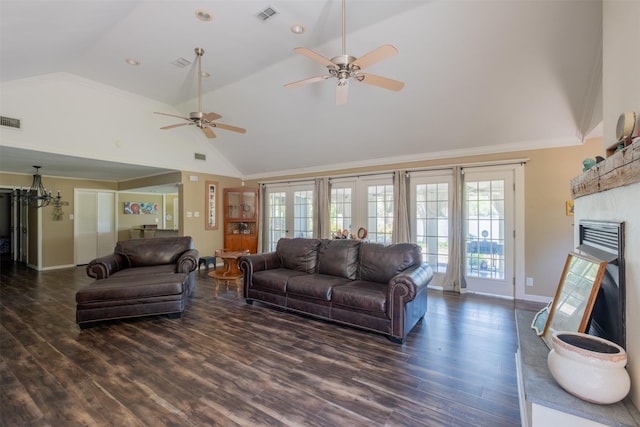 living room featuring visible vents, baseboards, a ceiling fan, and wood finished floors