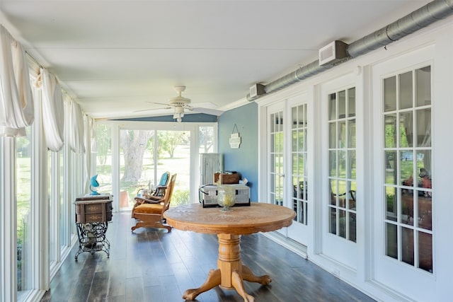 sunroom featuring visible vents and wood finished floors