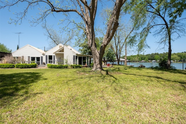 view of yard with a water view