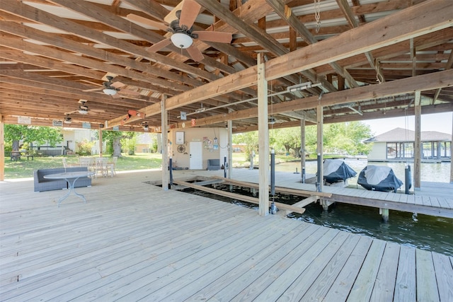 view of dock with boat lift