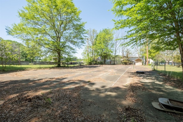 view of community with fence