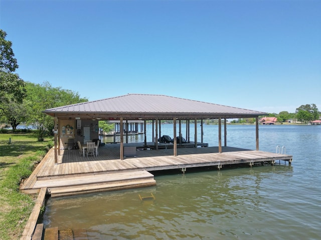 dock area featuring a water view and boat lift