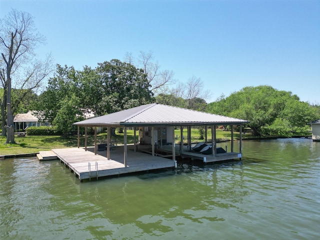 dock area featuring a water view and boat lift