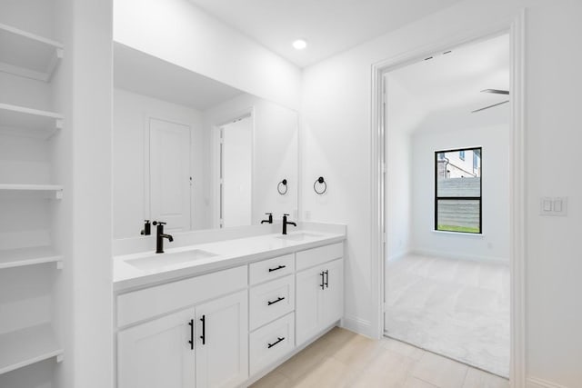1525 Ginger Ln, Argyle, TX 76226 - bathroom featuring baseboards, double vanity, and a sink