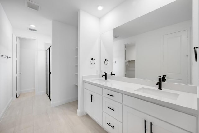 1525 Ginger Ln, Argyle, TX 76226 - bathroom with a stall shower, a sink, and visible vents