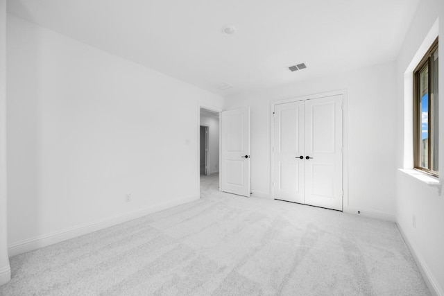 1525 Ginger Ln, Argyle, TX 76226 - unfurnished bedroom with carpet flooring, a closet, visible vents, and baseboards