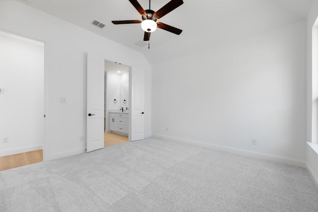 1525 Ginger Ln, Argyle, TX 76226 - unfurnished bedroom with connected bathroom, ceiling fan, visible vents, baseboards, and light carpet