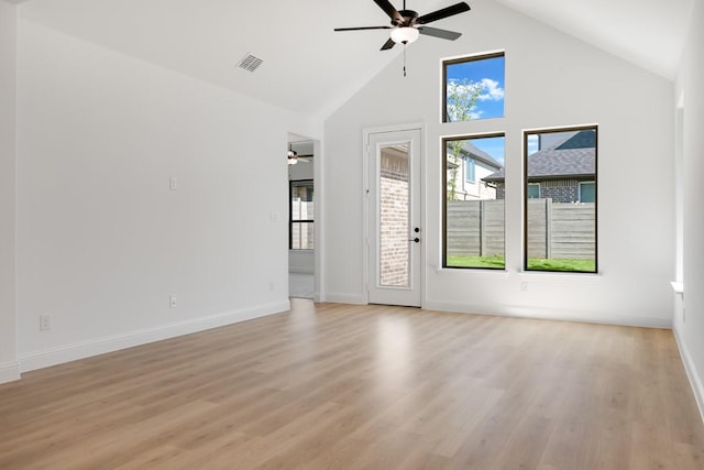 1525 Ginger Ln, Argyle, TX 76226 - unfurnished room featuring light wood-style floors, baseboards, visible vents, a ceiling fan, and high vaulted ceiling