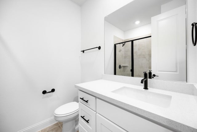 1525 Ginger Ln, Argyle, TX 76226 - full bath featuring tile patterned flooring, toilet, vanity, baseboards, and a stall shower