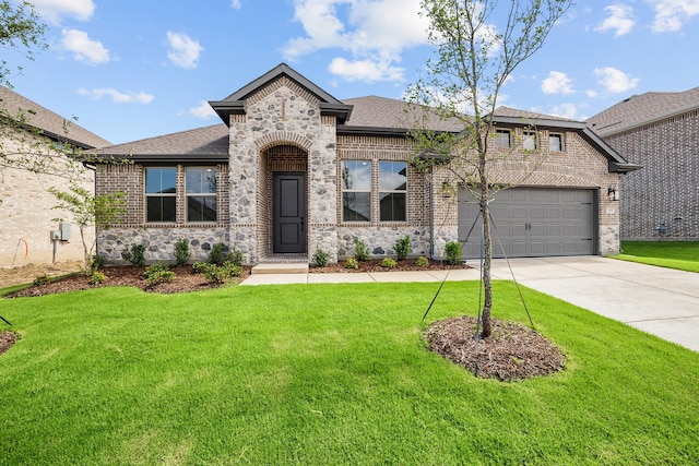 763 Emerald Hts, Lavon, TX 75166 - french provincial home with brick siding, driveway, a front yard, and roof with shingles