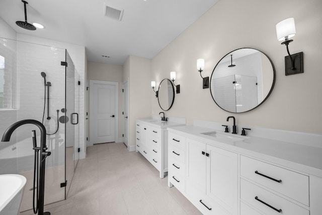 763 Emerald Hts, Lavon, TX 75166 - bathroom featuring a shower stall, double vanity, a freestanding tub, and baseboards