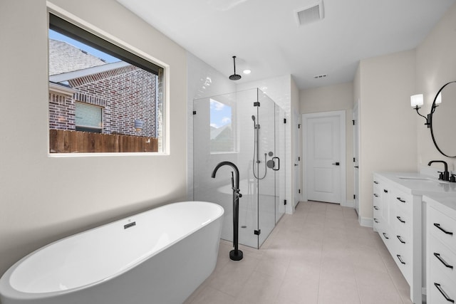763 Emerald Hts, Lavon, TX 75166 - full bathroom featuring a shower stall, a freestanding tub, vanity, recessed lighting, and baseboards