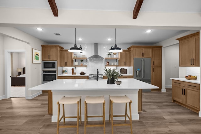 763 Emerald Hts, Lavon, TX 75166 - kitchen with appliances with stainless steel finishes, wall chimney range hood, beam ceiling, open shelves, and tasteful backsplash