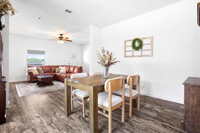 500 E Criner St, Grandview, TX 76050 - dining area featuring wood finished floors, visible vents, a ceiling fan, and baseboards