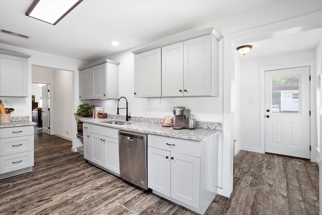 500 E Criner St, Grandview, TX 76050 - kitchen featuring dark wood finished floors, recessed lighting, dishwasher, a sink, and visible vents