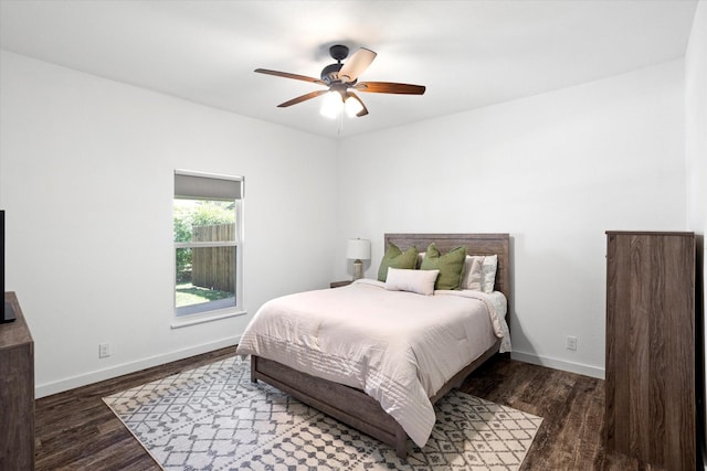 500 E Criner St, Grandview, TX 76050 - bedroom with baseboards, wood finished floors, and ceiling fan