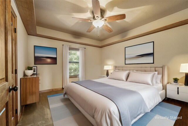 bedroom with visible vents, ceiling fan, and light carpet