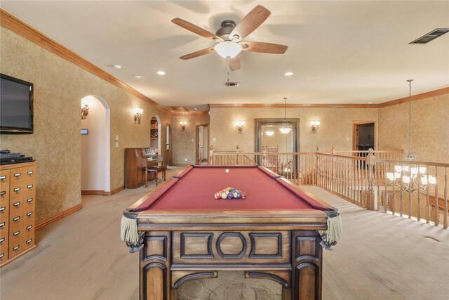 rec room featuring carpet flooring, a healthy amount of sunlight, and crown molding