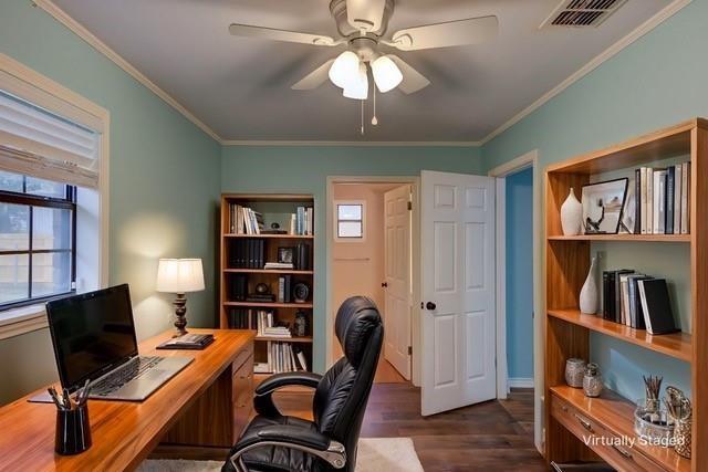 5411 Sage Dr, Bossier City, LA 71112 - office area featuring dark wood-style floors, ornamental molding, a ceiling fan, and visible vents