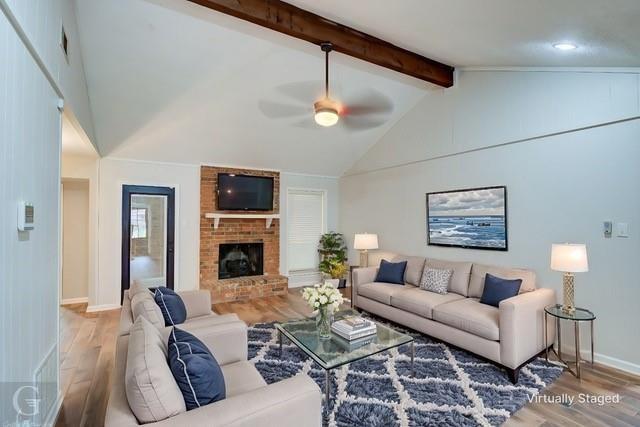 5411 Sage Dr, Bossier City, LA 71112 - living room featuring baseboards, beamed ceiling, a ceiling fan, and wood finished floors