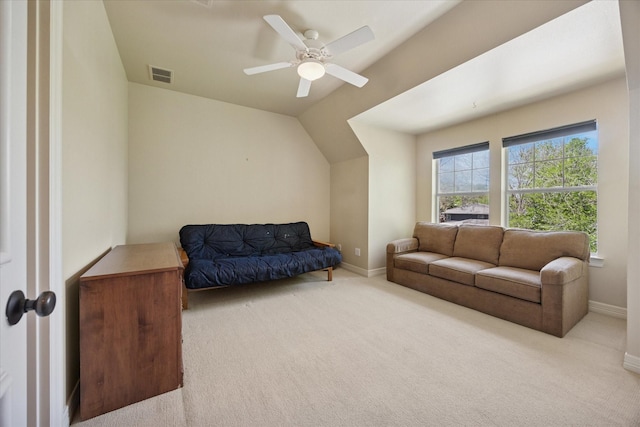 living area with ceiling fan, carpet flooring, baseboards, and visible vents